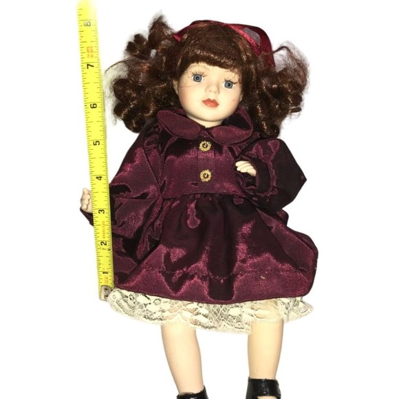 Cute Bright Eyed Brunette Porcelain Doll (Sitting Position) - Burgundy Dress - Picture 6 of 6